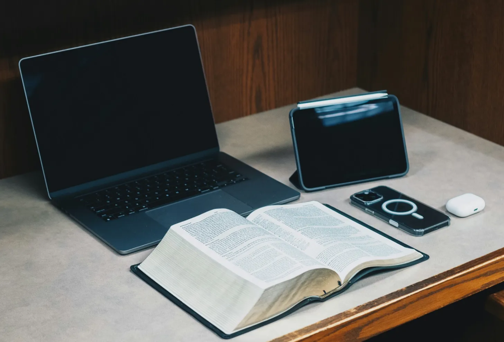 image of a bible, coffee and computer