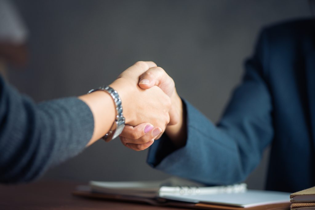 image of a donor shaking hands
