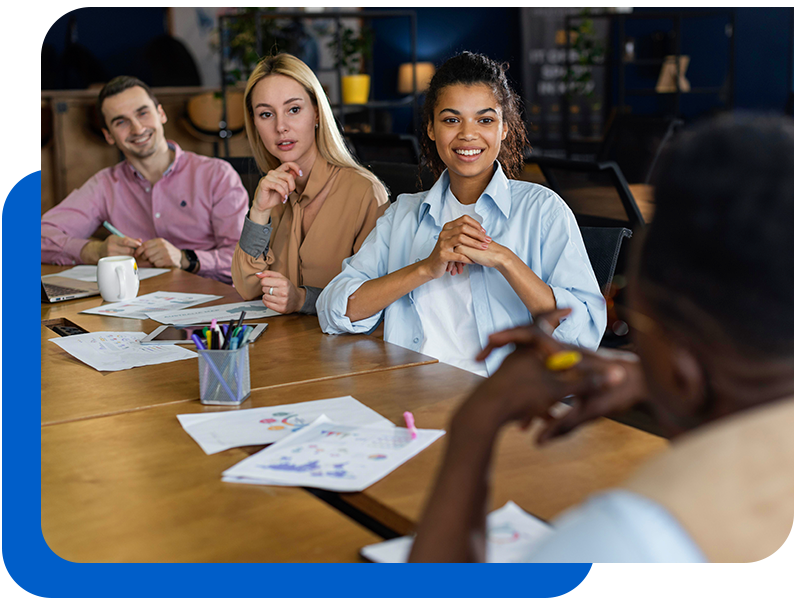teamphoto image of a leader in a team meeting