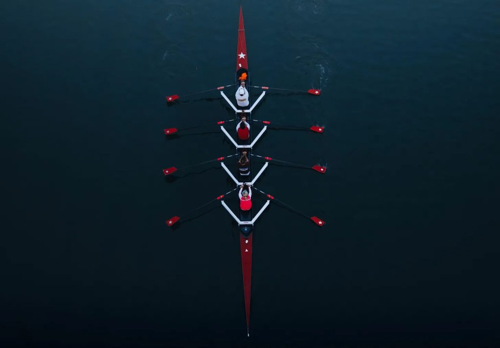 image of a rowing team