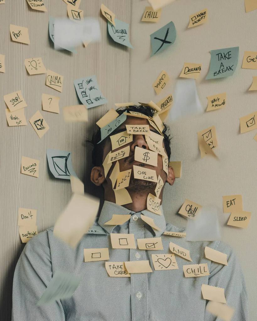 image of a man covered in sticky notes